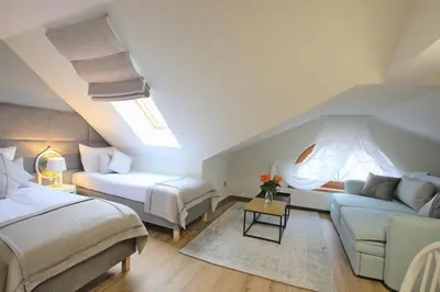 Łóżko lub łóżka w pokoju w obiekcie Hotel na Skarpie