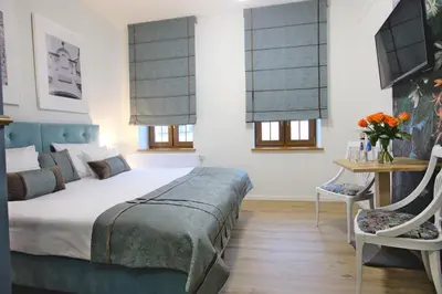 Łóżko lub łóżka w pokoju w obiekcie Hotel na Skarpie
