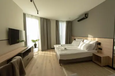 Łóżko lub łóżka w pokoju w obiekcie Sarnia Point Apartamenty Prestige