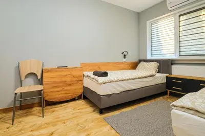 Łóżko lub łóżka w pokoju w obiekcie Villa Krotoszyce