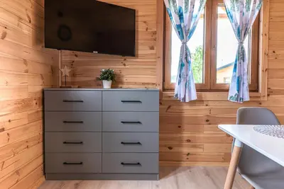 Telewizja i/lub zestaw kina domowego w obiekcie Osada Trzy Siostry