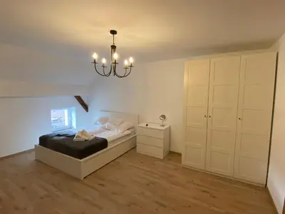 Łóżko lub łóżka w pokoju w obiekcie Stadnina Koni w Kłaczynie