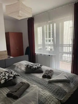 Łóżko lub łóżka w pokoju w obiekcie Antonina ***PensjonPrzyKortach***