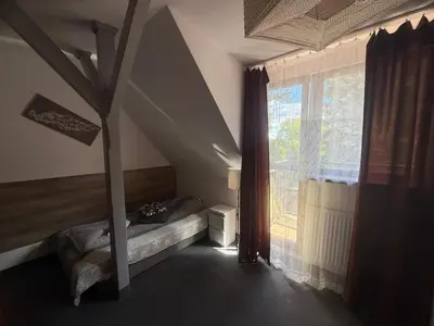 Łóżko lub łóżka w pokoju w obiekcie Antonina ***PensjonPrzyKortach***