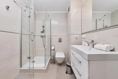 Łazienka w obiekcie City Center Railway Station Apartment Piłsudskiego by Noclegi Renters