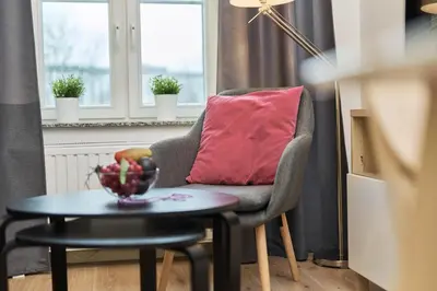 Część wypoczynkowa w obiekcie City Center Railway Station Apartment Piłsudskiego by Noclegi Renters