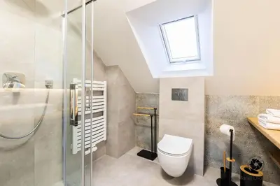 Łazienka w obiekcie Liliowy Apartament