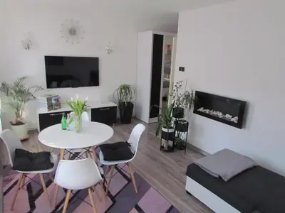 Telewizja i/lub zestaw kina domowego w obiekcie Apartament Ella