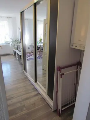 Łóżko lub łóżka w pokoju w obiekcie Apartament Ella