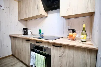 Kuchnia lub aneks kuchenny w obiekcie Przycup w Karkonoszach Apartamenty Słoneczna dolina 7B - domek na wyłączność w Karkonoszach