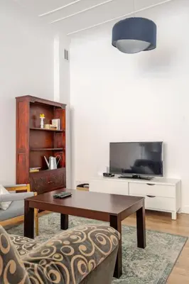 Telewizja i/lub zestaw kina domowego w obiekcie Apartament ROZETA centrum 6os