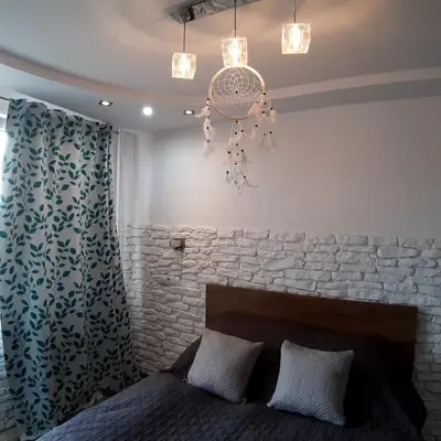 Łóżko lub łóżka w pokoju w obiekcie Apartament Hetmańska