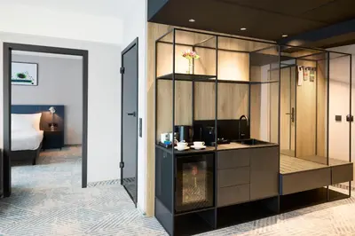 Telewizja i/lub zestaw kina domowego w obiekcie Q Hotel Plus Wrocław