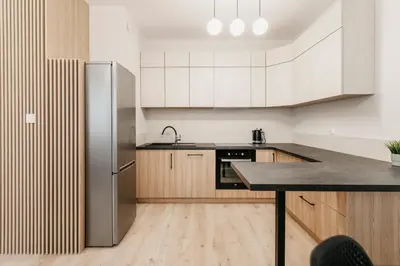Kuchnia lub aneks kuchenny w obiekcie Nocosfera Apartament Wrocławski