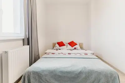 Łóżko lub łóżka w pokoju w obiekcie Nocosfera Apartament Wrocławski