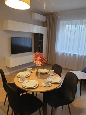 Telewizja i/lub zestaw kina domowego w obiekcie Modern Apartment