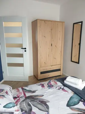 Łóżko lub łóżka w pokoju w obiekcie Modern Apartment