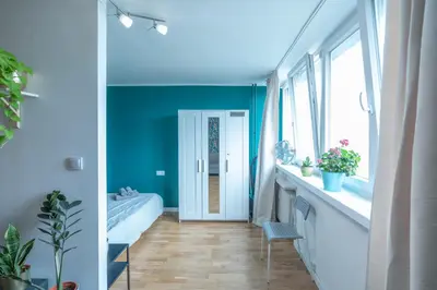 Łóżko lub łóżka w pokoju w obiekcie Green studio in the city center of Wroclaw