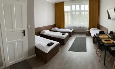 Łóżko lub łóżka w pokoju w obiekcie Noclegi Comfort - Self Check-in 24h