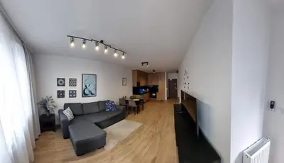Część wypoczynkowa w obiekcie Apartament Near Sky Tower