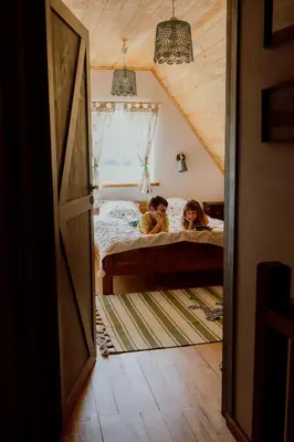 Łóżko lub łóżka w pokoju w obiekcie Chata Waliszów
