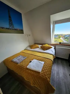 Łóżko lub łóżka w pokoju w obiekcie Apartament Pod Radiostacją -Gliwice Tarnogórska, parking free, klimatyzacja