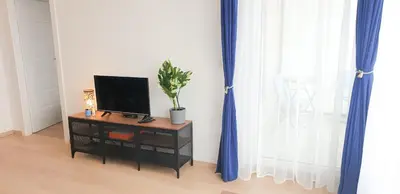 Telewizja i/lub zestaw kina domowego w obiekcie Fairytales Apartment