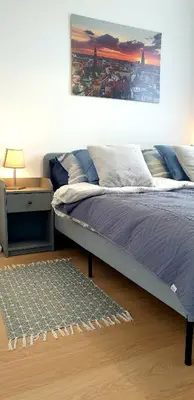 Łóżko lub łóżka w pokoju w obiekcie Fairytales Apartment