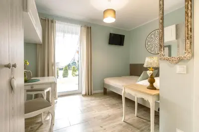 Plan piętra w obiekcie APARTEMENTY ''WERANDA'' z ogrodem w centrum