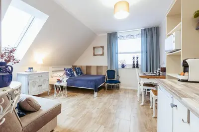 Część wypoczynkowa w obiekcie APARTEMENTY ''WERANDA'' z ogrodem w centrum