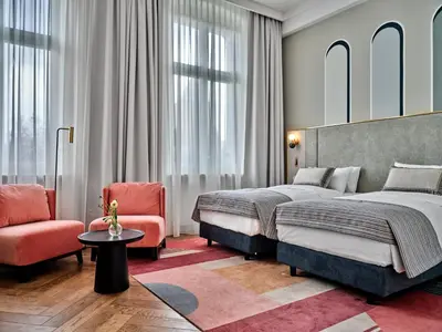 Łóżko lub łóżka w pokoju w obiekcie Hotel Altus Palace - Destigo Hotels