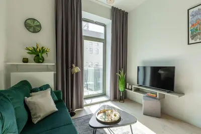 Telewizja i/lub zestaw kina domowego w obiekcie Apartament Księżycowy - Młyn Maria - Art Apartments