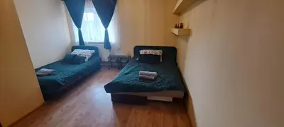 Łóżko lub łóżka w pokoju w obiekcie Apartament Alcatraz 90m z kominkiem Kamienna Góra