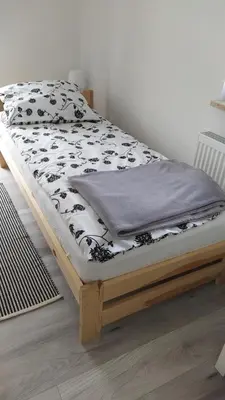 Łóżko lub łóżka w pokoju w obiekcie Sielska Dolina pod Ślężą