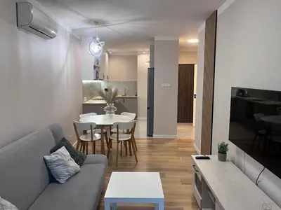 Telewizja i/lub zestaw kina domowego w obiekcie Złote Apartamenty 36