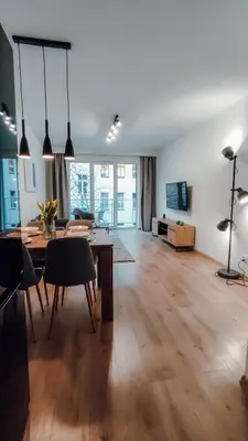Telewizja i/lub zestaw kina domowego w obiekcie Złote Apartamenty 36