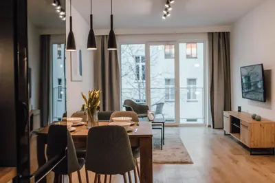 Telewizja i/lub zestaw kina domowego w obiekcie Złote Apartamenty 36