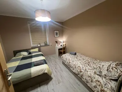 Łóżko lub łóżka w pokoju w obiekcie Apartament Antonio