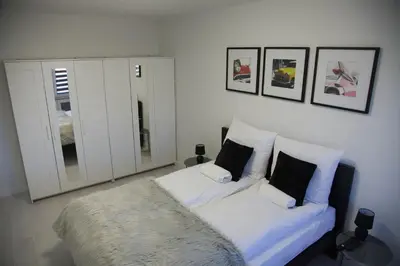 Łóżko lub łóżka w pokoju w obiekcie Apartament Wrocław Borowska