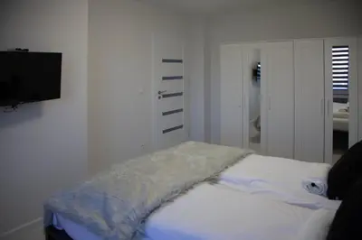 Łóżko lub łóżka w pokoju w obiekcie Apartament Wrocław Borowska