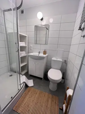 Łazienka w obiekcie APARTAMENT OŚ. JASNE 9C