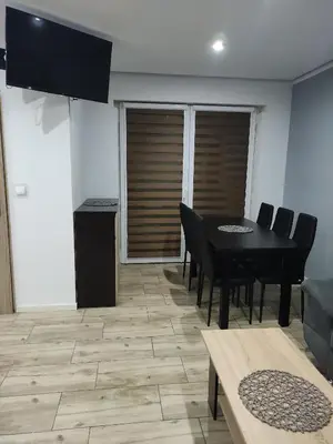 Telewizja i/lub zestaw kina domowego w obiekcie Apartamenty Quattro