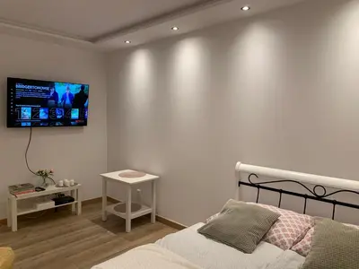 Telewizja i/lub zestaw kina domowego w obiekcie Sweet apartament