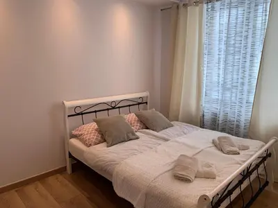 Łóżko lub łóżka w pokoju w obiekcie Sweet apartament