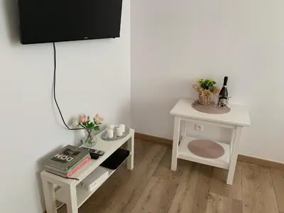 Telewizja i/lub zestaw kina domowego w obiekcie Sweet apartament