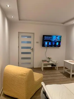 Telewizja i/lub zestaw kina domowego w obiekcie Sweet apartament