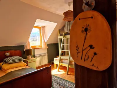 Łóżko lub łóżka w pokoju w obiekcie Miodówka