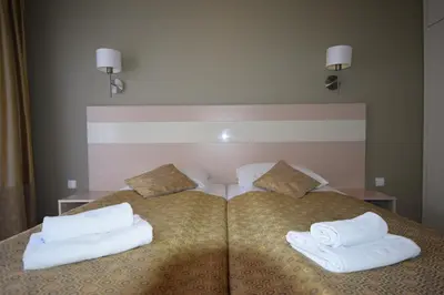 Łóżko lub łóżka w pokoju w obiekcie Apartament Czarna Gora Is6