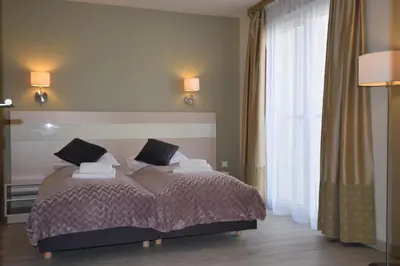 Łóżko lub łóżka w pokoju w obiekcie Apartament Czarna Góra Is17
