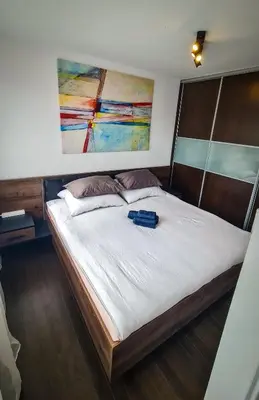 Łóżko lub łóżka w pokoju w obiekcie Peters Loft